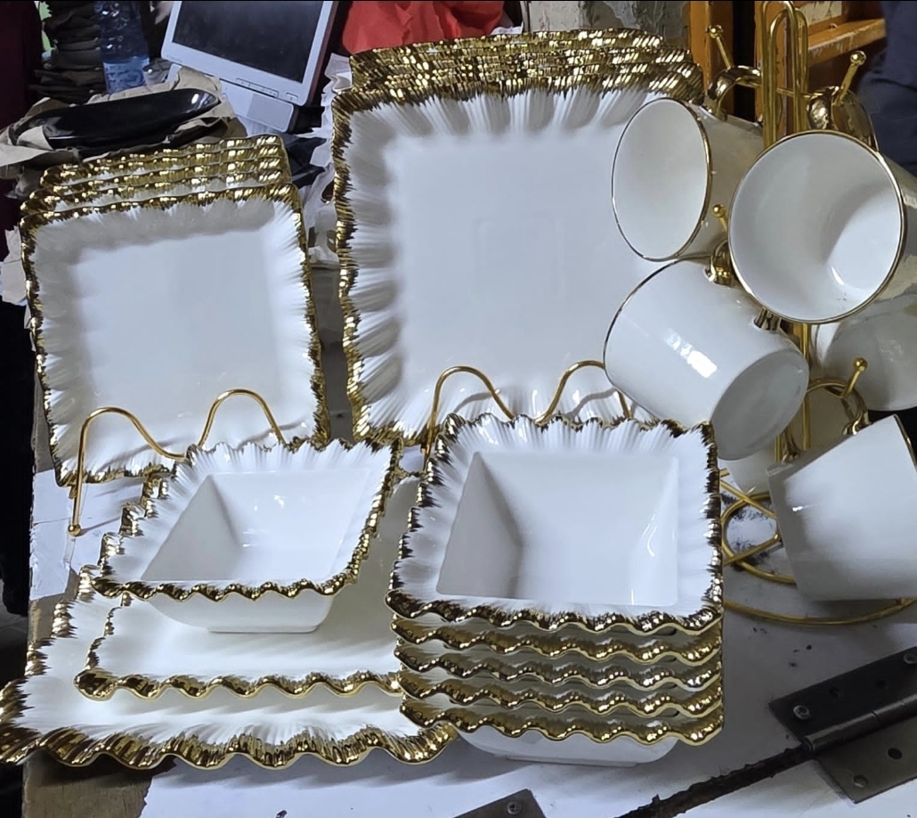 24-Piece Classic Ceramic Dining Collection with golden wave finish